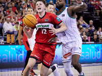 Agustin Ubal of Coviran Granada competes for the ball with Melvin Ejim of Unicaja Malaga during the Liga Endesa ACB league basketball match...