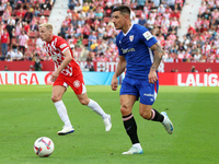 Alex Berenguer plays during the match between Girona FC and Athletic Club, corresponding to week 9 of LaLiga EA Sport, at the Montilivi Stad...