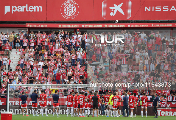 Girona players celebrate victory with their supporters at the end of the match between Girona FC and Athletic Club, corresponding to week 9...