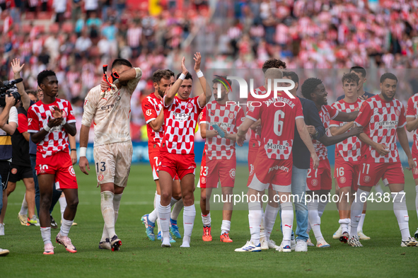 In Girona, Spain, on October 6, 2024, Girona FC players celebrate after the LaLiga EA Sports match between Girona FC and Athletic Club de Bi...