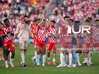 In Girona, Spain, on October 6, 2024, Girona FC players celebrate after the LaLiga EA Sports match between Girona FC and Athletic Club de Bi...