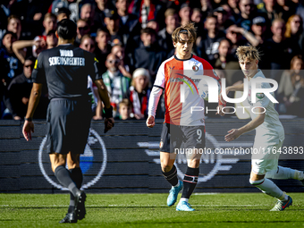 Feyenoord Rotterdam forward Ayase Ueda and FC Twente defender Max Bruns play during the match between Feyenoord and Twente at the Feyenoord...