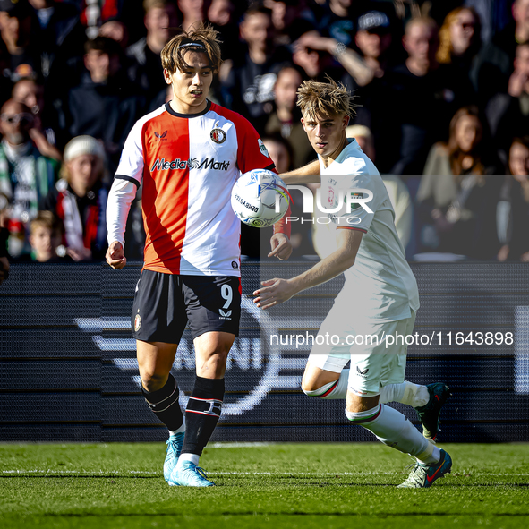 Feyenoord Rotterdam forward Ayase Ueda and FC Twente defender Max Bruns play during the match between Feyenoord and Twente at the Feyenoord...