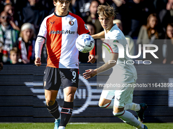 Feyenoord Rotterdam forward Ayase Ueda and FC Twente defender Max Bruns play during the match between Feyenoord and Twente at the Feyenoord...