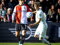 Feyenoord Rotterdam forward Ayase Ueda and FC Twente defender Max Bruns play during the match between Feyenoord and Twente at the Feyenoord...