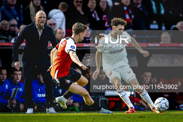 Feyenoord Rotterdam defender Gijs Smal and FC Twente forward Mitchell van Bergen play during the match between Feyenoord and Twente at the F...