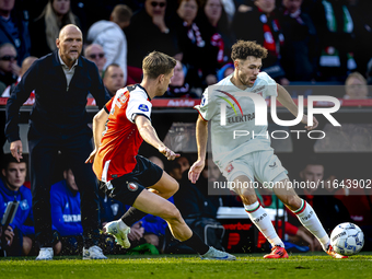 Feyenoord Rotterdam defender Gijs Smal and FC Twente forward Mitchell van Bergen play during the match between Feyenoord and Twente at the F...