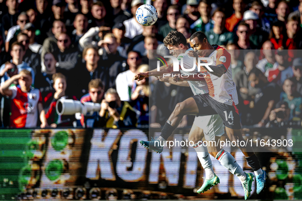 Feyenoord Rotterdam forward Igor Paixao and FC Twente defender Bas Kuipers play during the match between Feyenoord and Twente at the Feyenoo...