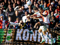 Feyenoord Rotterdam forward Igor Paixao and FC Twente defender Bas Kuipers play during the match between Feyenoord and Twente at the Feyenoo...