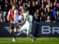 Feyenoord Rotterdam forward Ayase Ueda and FC Twente defender Max Bruns play during the match between Feyenoord and Twente at the Feyenoord...