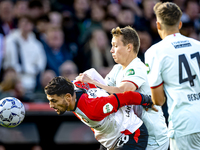 Feyenoord Rotterdam forward Santiago Gimenez and FC Twente midfielder Mathias Kjolo play during the match between Feyenoord and Twente at th...