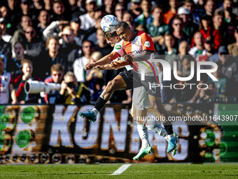 Feyenoord Rotterdam forward Igor Paixao and FC Twente defender Bas Kuipers play during the match between Feyenoord and Twente at the Feyenoo...