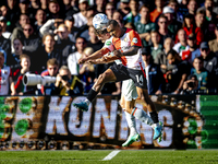 Feyenoord Rotterdam forward Igor Paixao and FC Twente defender Bas Kuipers play during the match between Feyenoord and Twente at the Feyenoo...