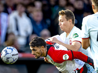 Feyenoord Rotterdam forward Santiago Gimenez and FC Twente midfielder Mathias Kjolo play during the match between Feyenoord and Twente at th...