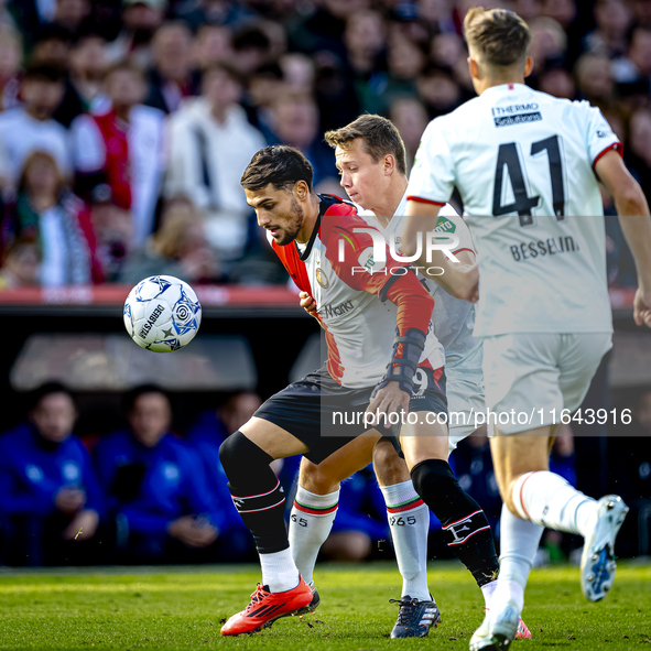 Feyenoord Rotterdam forward Santiago Gimenez and FC Twente midfielder Mathias Kjolo play during the match between Feyenoord and Twente at th...