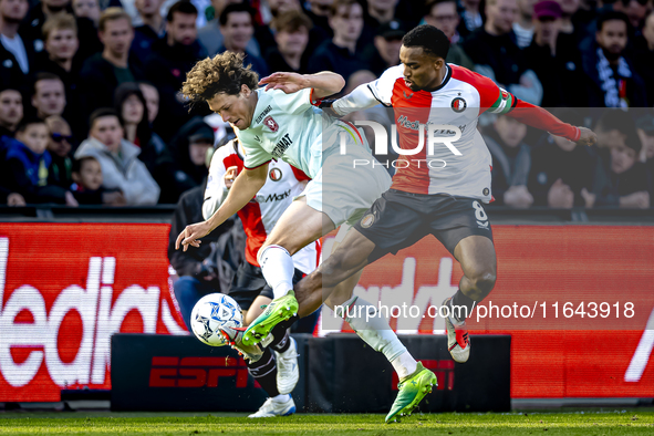 FC Twente forward Sam Lammers and Feyenoord Rotterdam midfielder Quinten Timber play during the match between Feyenoord and Twente at the Fe...