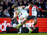 FC Twente forward Sam Lammers and Feyenoord Rotterdam midfielder Quinten Timber play during the match between Feyenoord and Twente at the Fe...