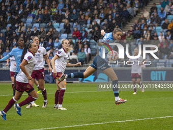 Vivianne Miedema #6 of Manchester City W.F.C. heads the ball during the Barclays FA Women's Super League match between Manchester City and W...