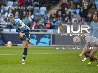 Vivianne Miedema #6 of Manchester City W.F.C. takes a shot at goal during the Barclays FA Women's Super League match between Manchester City...