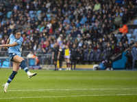 Laia Aleixandri #4 of Manchester City W.F.C. takes a shot at goal during the Barclays FA Women's Super League match between Manchester City...