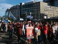 Hundreds of people take part in the ''Bring Them Home'' march to mark the first anniversary of the October 7 Hamas attack, which creates a r...