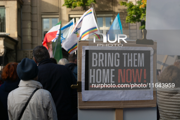 Hundreds of people take part in the ''Bring Them Home'' march to mark the first anniversary of the October 7 Hamas attack, which creates a r...