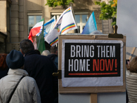 Hundreds of people take part in the ''Bring Them Home'' march to mark the first anniversary of the October 7 Hamas attack, which creates a r...