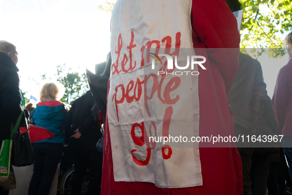 Hundreds of people take part in the ''Bring Them Home'' march to mark the first anniversary of the October 7 Hamas attack, which creates a r...