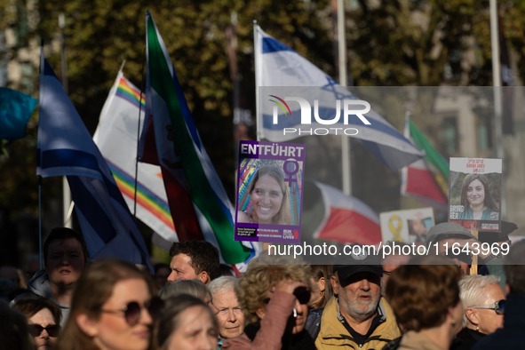 Hundreds of people take part in the ''Bring Them Home'' march to mark the first anniversary of the October 7 Hamas attack, which creates a r...