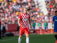 Players are in action during the LaLiga EA Sports match between Girona FC and Athletic Club de Bilbao at Montilivi Stadium in Girona, Spain,...