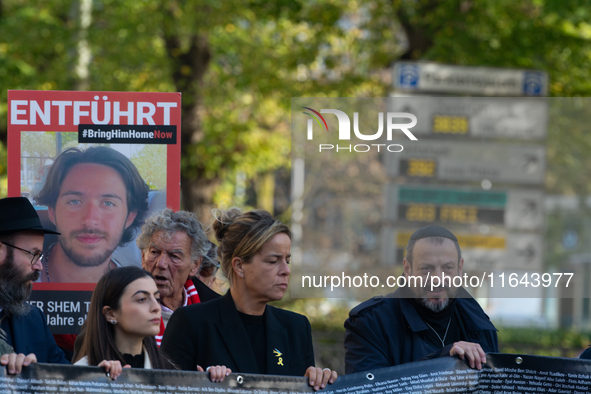 Mona Neubaur, NRW Minister of Economy, takes part in a walk as hundreds of people participate in the ''bring them home'' march to mark the f...