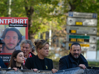 Mona Neubaur, NRW Minister of Economy, takes part in a walk as hundreds of people participate in the ''bring them home'' march to mark the f...