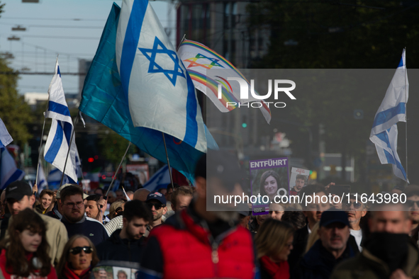 Hundreds of people take part in the ''Bring Them Home'' march to mark the first anniversary of the October 7 Hamas attack, which creates a r...