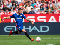 Alex Berenguer of Athletic Club de Bilbao is in action during the LaLiga EA Sports match between Girona FC and Athletic Club de Bilbao at Mo...