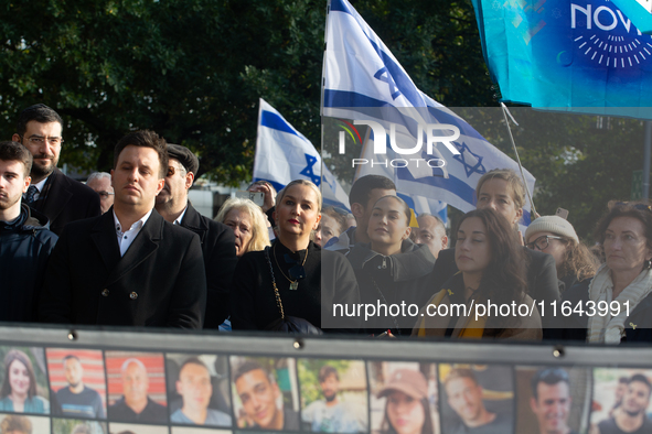 Hundreds of people take part in the ''Bring Them Home'' march to mark the first anniversary of the October 7 Hamas attack, which creates a r...