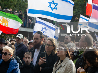 Hundreds of people take part in the ''Bring Them Home'' march to mark the first anniversary of the October 7 Hamas attack, which creates a r...