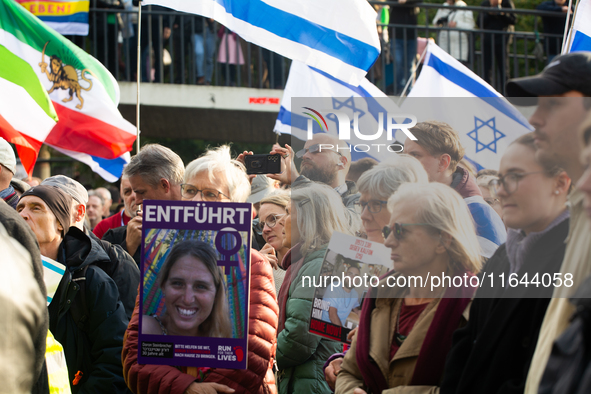 Hundreds of people take part in the ''Bring Them Home'' march to mark the first anniversary of the October 7 Hamas attack, which creates a r...