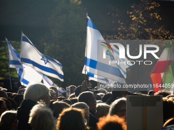 Hundreds of people take part in the ''Bring Them Home'' march to mark the first anniversary of the October 7 Hamas attack, which creates a r...