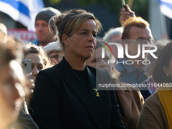 Mona Neubaur, NRW Minister of Economy, takes part in a walk as hundreds of people participate in the ''bring them home'' march to mark the f...