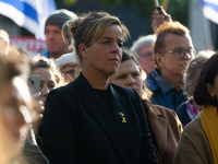 Mona Neubaur, NRW Minister of Economy, takes part in a walk as hundreds of people participate in the ''bring them home'' march to mark the f...