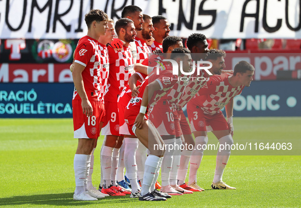 The Girona team plays during the match between Girona FC and Athletic Club, corresponding to week 9 of LaLiga EA Sport, at the Montilivi Sta...