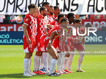 The Girona team plays during the match between Girona FC and Athletic Club, corresponding to week 9 of LaLiga EA Sport, at the Montilivi Sta...