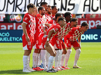 The Girona team plays during the match between Girona FC and Athletic Club, corresponding to week 9 of LaLiga EA Sport, at the Montilivi Sta...