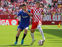 Miguel Gutierrez and Oihan Sancet play during the match between Girona FC and Athletic Club, corresponding to week 9 of LaLiga EA Sport, at...