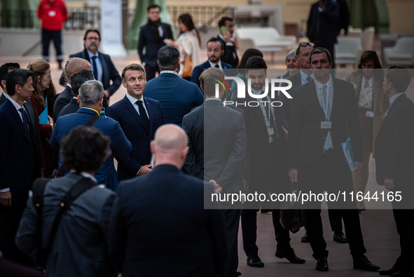 President of the French Republic Emmanuel Macron attends the second and final day of the Francophonie Summit at the Grand Palais in Paris, F...