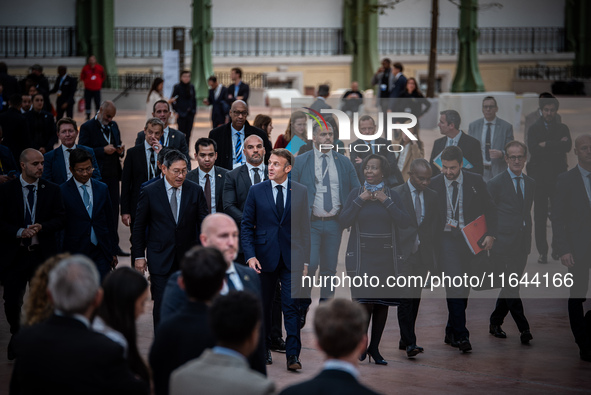 President of the French Republic Emmanuel Macron attends the second and final day of the Francophonie Summit at the Grand Palais in Paris, F...