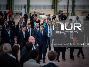 President of the French Republic Emmanuel Macron attends the second and final day of the Francophonie Summit at the Grand Palais in Paris, F...