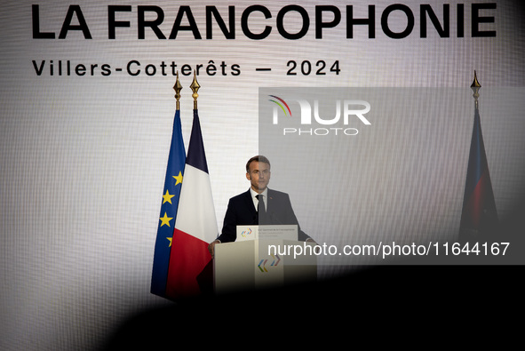 President of the French Republic Emmanuel Macron attends the second and final day of the Francophonie Summit at the Grand Palais in Paris, F...