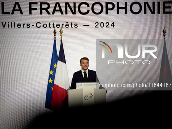 President of the French Republic Emmanuel Macron attends the second and final day of the Francophonie Summit at the Grand Palais in Paris, F...