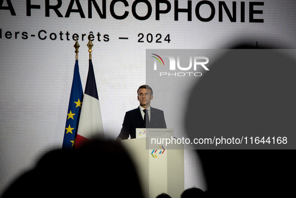 President of the French Republic Emmanuel Macron attends the second and final day of the Francophonie Summit at the Grand Palais in Paris, F...